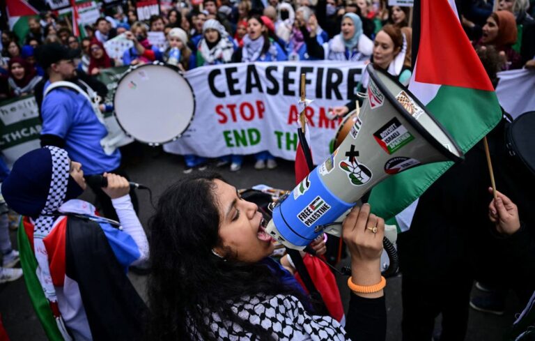 Thousands of pro-Palestinian supporters march through London calling for ceasefire