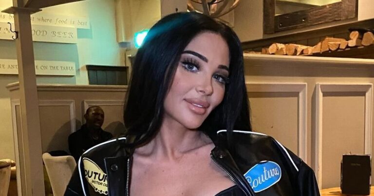 N-Dubz beauty Tulisa teases cleavage in corset and thigh-high boots as fans sweat