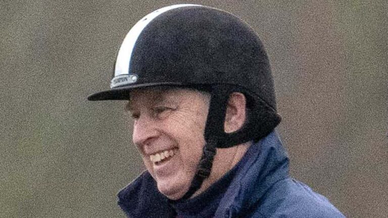 Prince Andrew is seen smiling while riding a horse in Windsor