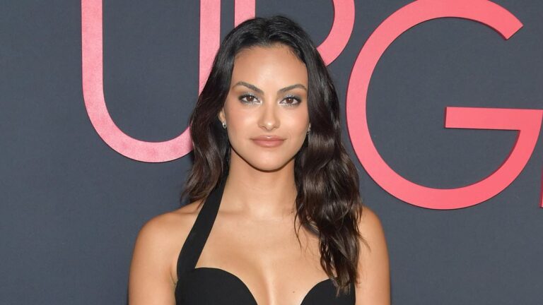 Camila Mendes flaunts a black pantsuit alongside timeless beauty Marisa Tomei at romantic movie premiere