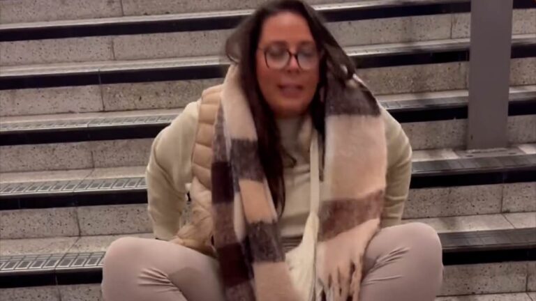 The moment a 29-year-old wheelchair user crawls up the stairs at London Overground station after the elevator breaks down.