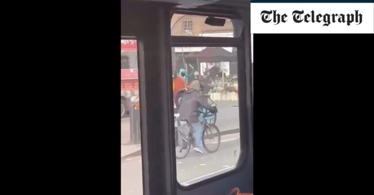Masked men clash in a ‘machete fight’ on a crowded London street outside a tube station