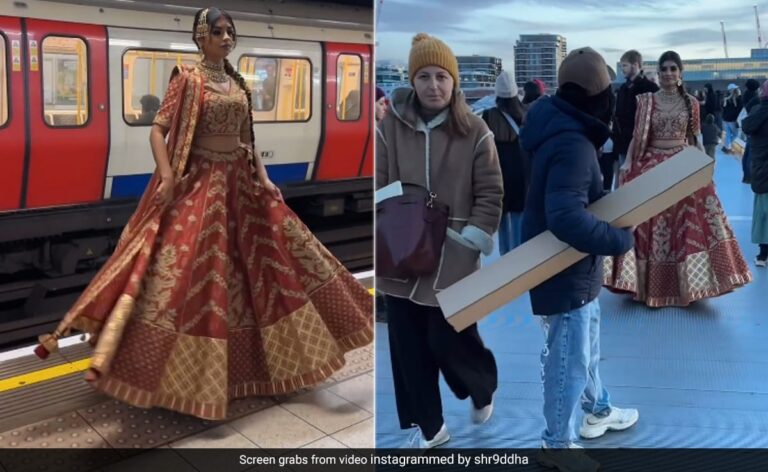 A woman walks through the streets of London wearing a wedding dress “lehenga” and attracts attention.