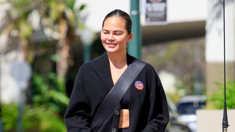 Chrissy Teigen is a fresh-faced beauty smiling after voting in Beverly Hills on Super Tuesday
