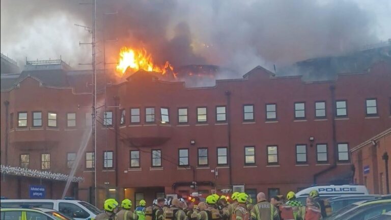 More than 170 firefighters battle fire at London police station | UK News