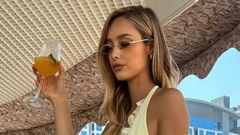 Former Premier League wag and ‘hottest woman in the world’ goes braless in daring backless dress as fans cheer ‘radiant’