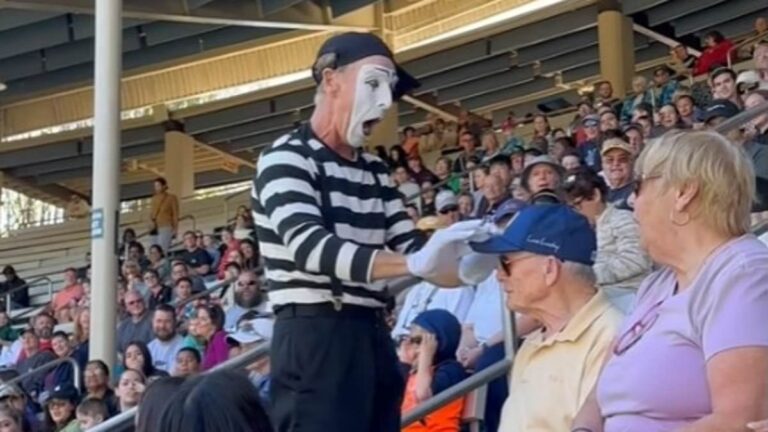 A heartbroken mime says he was fired from SeaWorld after 36 years over a disagreement with a security guard.