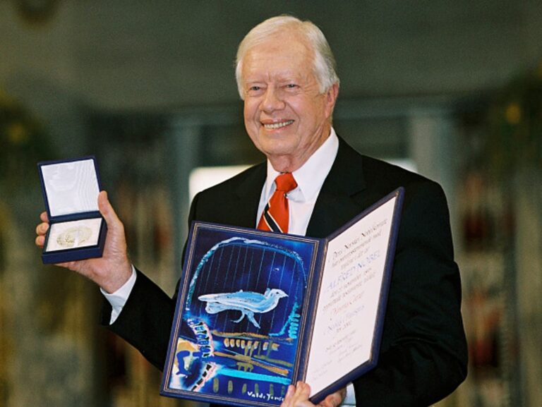 Jimmy Carter doesn’t wake up every day, but he ‘experiences the world as much as he can,’ grandson says