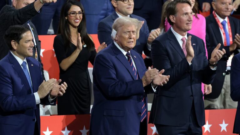 A bandaged Donald Trump makes his “man’s world” entrance into the Republican Convention and watches as new vice presidential nominee J.D. Vance gives his main speech.